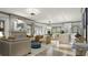 Open-concept living space with hardwood floors, fireplace, and a kitchen island with seating at 0 Paige St, Dallas, GA 30157