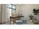 Home office featuring desk, chair, patterned wallpaper, and multiple plants at 0 Paige St, Dallas, GA 30157