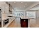 Gourmet kitchen with quartz counters, stainless appliances, and a large island at 2750 Herrington Dr, Cumming, GA 30041