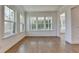 Sun Room with large windows and hardwood floors at 2750 Herrington Dr, Cumming, GA 30041