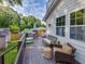 Relaxing back deck with outdoor seating, ideal for entertaining and enjoying the scenery at 3215 Woodview Se Dr, Smyrna, GA 30082