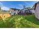 Spacious backyard with a two-level deck, green grass, and privacy fence at 3215 Woodview Se Dr, Smyrna, GA 30082