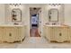 Elegant bathroom featuring double vanities with stylish mirrors and decor at 3215 Woodview Se Dr, Smyrna, GA 30082