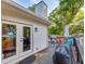 View of the outdoor deck with chairs and grill, a great place to spend time outside at 3215 Woodview Se Dr, Smyrna, GA 30082
