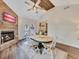Inviting dining area with a fireplace, wood floors, and views of the patio from the french doors at 3215 Woodview Se Dr, Smyrna, GA 30082