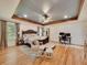 Spacious main bedroom with hardwood floors, a large bed, and an office area at 3215 Woodview Se Dr, Smyrna, GA 30082