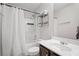 Cozy bathroom with combination tub and shower, and vanity at 5575 Hedge Brook Dr, Cumming, GA 30028