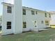 Exterior of house featuring the backyard, patio, and greenery at 7097 Cavender Sw Dr, Atlanta, GA 30331