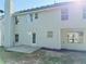 Backyard patio of house is an ideal outdoor living space at 7097 Cavender Sw Dr, Atlanta, GA 30331