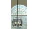 Close up of chandelier near a window at 7097 Cavender Sw Dr, Atlanta, GA 30331