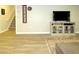 Finished basement area with hard surface floors, a TV, and a neutral color scheme at 21 Devin Lane Ln, Euharlee, GA 30145