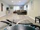 Spacious finished basement with recessed lighting, seating and a large rug at 21 Devin Lane Ln, Euharlee, GA 30145