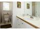 Bathroom features white cabinets, laminate countertop, and decorative touches at 21 Devin Lane Ln, Euharlee, GA 30145