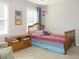 Cozy bedroom featuring natural light, a wood-framed bed, and neutral decor at 21 Devin Lane Ln, Euharlee, GA 30145