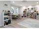 Bright bonus room with shelving and a long table with chairs at 21 Devin Lane Ln, Euharlee, GA 30145