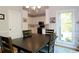 Dining room featuring hardwood floors that opens to a bright kitchen at 21 Devin Lane Ln, Euharlee, GA 30145