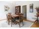 Traditional dining room with hardwood floors, elegant chandelier, and wood china cabinet at 21 Devin Lane Ln, Euharlee, GA 30145