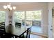 Bright dining room with natural light and a view of the outdoor deck at 21 Devin Lane Ln, Euharlee, GA 30145