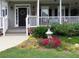 Charming front entrance to this two story home features a lovely porch with lush landscaping at 21 Devin Lane Ln, Euharlee, GA 30145