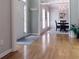 Inviting foyer with hardwood floors leads to a dining area featuring elegant chandelier lighting at 21 Devin Lane Ln, Euharlee, GA 30145
