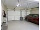 Spacious two car garage featuring epoxy flooring for durability and sleek aesthetics at 21 Devin Lane Ln, Euharlee, GA 30145