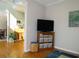 Hallway with hardwood floors, neutral walls, and a view into an adjacent dining room at 21 Devin Lane Ln, Euharlee, GA 30145