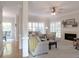 Bright living room with fireplace, ceiling fan, and an open layout for comfortable living and entertaining at 21 Devin Lane Ln, Euharlee, GA 30145