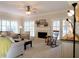 Spacious living room featuring a fireplace, ample seating, and large windows for abundant natural light at 21 Devin Lane Ln, Euharlee, GA 30145