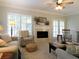 Inviting living room boasts a fireplace, comfortable seating, and large windows providing an abundance of natural light at 21 Devin Lane Ln, Euharlee, GA 30145