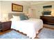 Comfortable main bedroom features a large bed, stylish decor, and hardwood flooring at 21 Devin Lane Ln, Euharlee, GA 30145