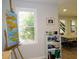 Bright office area featuring an easel, shelving, and natural light from large windows at 21 Devin Lane Ln, Euharlee, GA 30145
