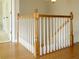 Beautiful wood staircase with white spindles leading to the upper level at 21 Devin Lane Ln, Euharlee, GA 30145