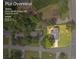 Aerial view of the property showcasing the house, lot lines, and surrounding neighborhood at 3642 S Bogan Rd, Buford, GA 30519