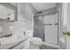 Bathroom features a shower and sink at 3642 S Bogan Rd, Buford, GA 30519