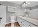 Bathroom features a bathtub and sink at 3642 S Bogan Rd, Buford, GA 30519