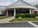 Exterior view of a community center featuring a large canopy at 3642 S Bogan Rd, Buford, GA 30519