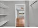 Walk-in closet with built-in shelving at 3642 S Bogan Rd, Buford, GA 30519
