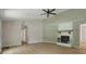 Inviting living room with hardwood floors, featuring a fireplace and neutral walls that create a cozy atmosphere at 589 Wilmont Dr, Jonesboro, GA 30238