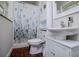 Small bathroom featuring stylish fixtures, vanity, and a shower with decorative curtain at 100 Eldorado Dr, Carrollton, GA 30116