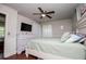 This spacious bedroom offers great natural light, ceiling fan, and a comfortable feel at 100 Eldorado Dr, Carrollton, GA 30116
