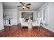Bright dining area with wood floors, modern decor, and a ceiling fan provides a great space for meals at 100 Eldorado Dr, Carrollton, GA 30116
