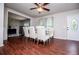 Bright dining area with wood floors, modern decor, and a ceiling fan provides a great space for meals at 100 Eldorado Dr, Carrollton, GA 30116