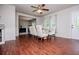 Bright dining area with wood floors, modern decor, and a ceiling fan provides a great space for meals at 100 Eldorado Dr, Carrollton, GA 30116