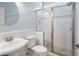 Clean bathroom with white tile, vanity and glass enclosed shower at 130 Bevington Ln, Woodstock, GA 30188