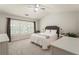 Bedroom with vaulted ceiling and large windows at 169 Wallnut Hall Circle, Woodstock, GA 30189