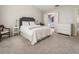 Comfortable main bedroom featuring neutral decor and an ensuite bathroom at 169 Wallnut Hall Circle, Woodstock, GA 30189