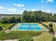 Aerial view of the community tennis courts, highlighting the well-maintained facilities and green surroundings at 169 Wallnut Hall Circle, Woodstock, GA 30189