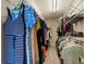 Walk-in closet with well-organized storage solutions at 169 Wallnut Hall Circle, Woodstock, GA 30189
