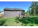 Home exterior features backyard deck and large lawn at 194 Saddleridge Dr, Bremen, GA 30110