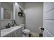 Bathroom with gray vanity, tiled floors, and neutral wall color at 194 Saddleridge Dr, Bremen, GA 30110